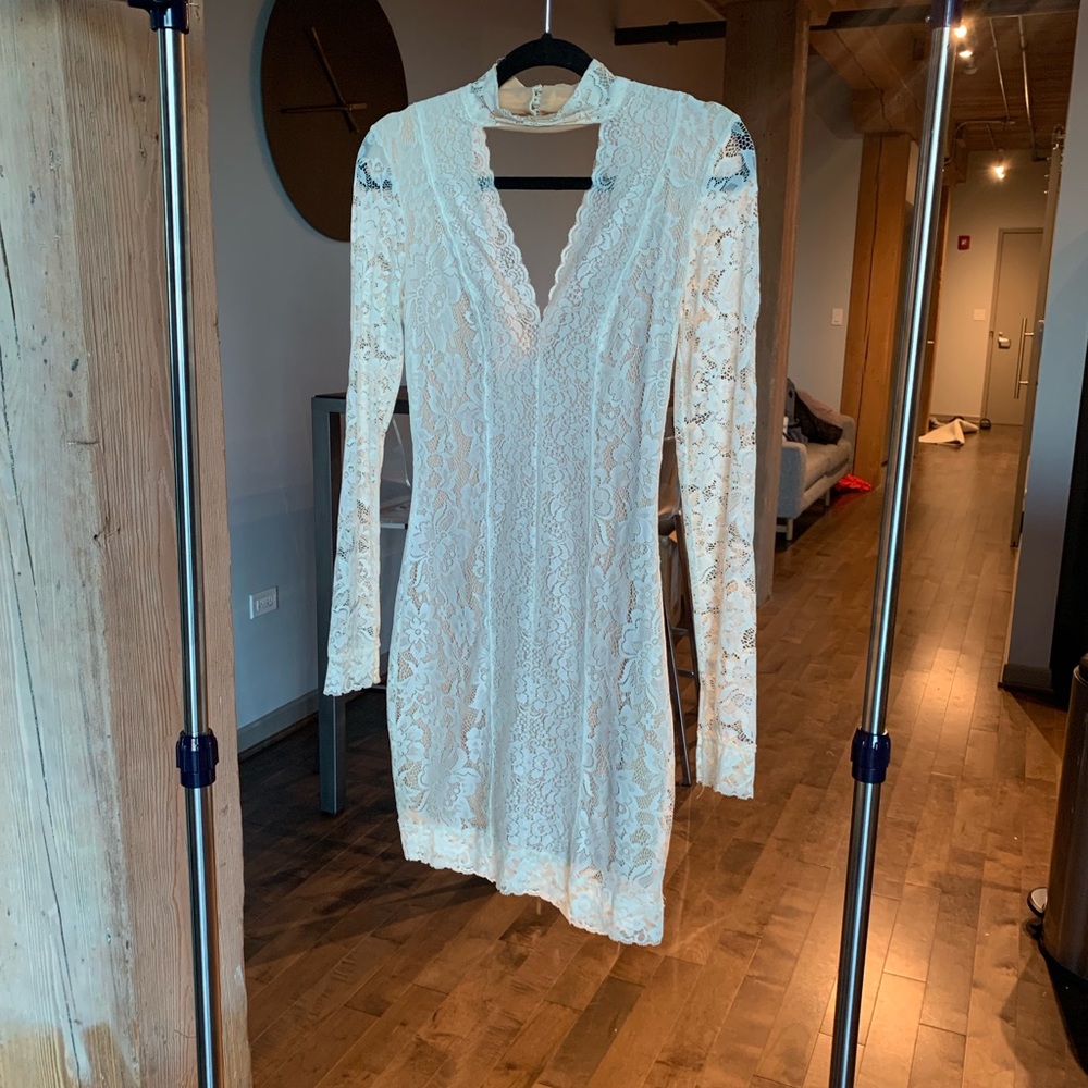 Bebe White long sleeve lace mini dress